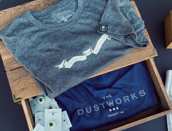 dustworks in dust we trust banner t-shirt and mohawk buttons made in USA merch